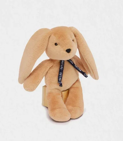 Close-up of the bunny puppet embroidered blue eyes and stitched smile on soft Maïloudou fabric for supreme cuddles — Bunny Puppet Dubai baby gift shipped worldwide.