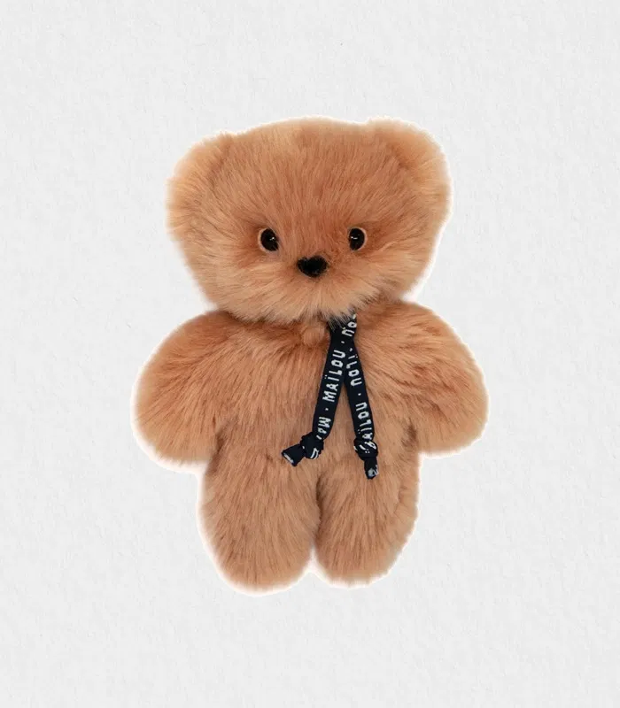 Le Petit Frenchie_L_B_1 Close-up of the plush baby bear’s velvety Maïloudou fur and embroidered features showcasing its handmade craftsmanship—plush baby bear Dubai baby gift shipped worldwide.